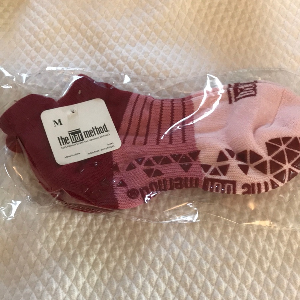 The Bar Method red/pink ombré socks